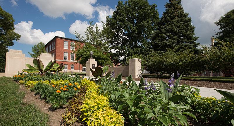 Flower bed in front of the Lincoln gate entrance to campus.